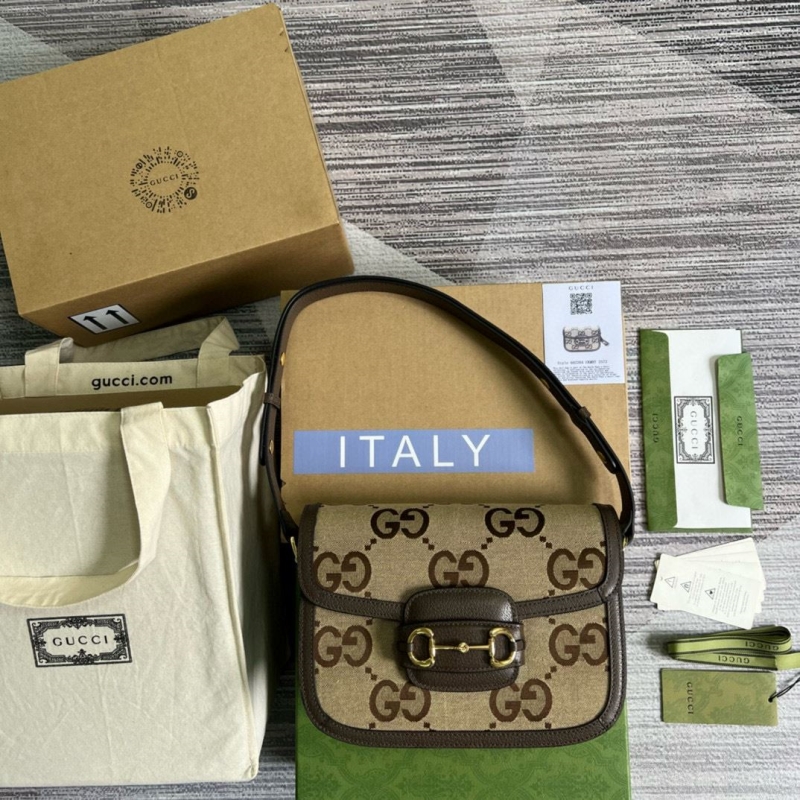 G*u*i top handle bags